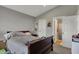 Bedroom with ensuite bathroom, neutral walls and carpet at 12030 Driftstone Dr, Fishers, IN 46037