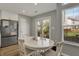 Dining area with access to the backyard and natural light at 12030 Driftstone Dr, Fishers, IN 46037
