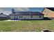 Spacious backyard featuring a patio and well-maintained lawn at 12334 Buckley Blvd, Indianapolis, IN 46229