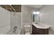 Charming bathroom showcasing a shower with mosaic tile accent and a wood vanity at 12334 Buckley Blvd, Indianapolis, IN 46229