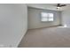 Cozy bedroom featuring neutral carpet and a ceiling fan at 12334 Buckley Blvd, Indianapolis, IN 46229