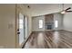 Spacious living room featuring hardwood floors and a cozy brick fireplace at 12334 Buckley Blvd, Indianapolis, IN 46229