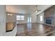 Bright living room with hardwood floors and a brick fireplace, perfect for entertaining at 12334 Buckley Blvd, Indianapolis, IN 46229