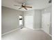Bright bedroom featuring neutral walls, ceiling fan, and closet with double doors at 1238 Passage Way, Plainfield, IN 46168
