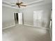 Spacious bedroom with a ceiling fan and neutral carpet at 1238 Passage Way, Plainfield, IN 46168