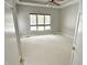 Neutral bedroom with a ceiling fan, neutral carpet, and three big windows at 1238 Passage Way, Plainfield, IN 46168