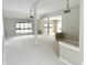 Bright living room with large windows, neutral paint, and an open layout great for entertaining at 1238 Passage Way, Plainfield, IN 46168