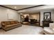 Spacious basement with a comfortable seating area, wet bar, and stylish decor, perfect for relaxation at 12813 Chapel Square St, Carmel, IN 46032