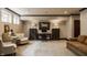 Finished basement featuring a seating area, desk space, natural light, and decorative accents at 12813 Chapel Square St, Carmel, IN 46032