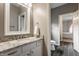 Elegant bathroom featuring granite countertops, sleek fixtures, and access to the bedroom for added convenience at 12813 Chapel Square St, Carmel, IN 46032