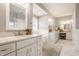Bright bathroom with dual sinks, vanity, and marble countertops offering lots of space at 12813 Chapel Square St, Carmel, IN 46032