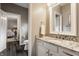 Elegant bathroom featuring granite countertops, sleek fixtures, and access to the bedroom for added convenience at 12813 Chapel Square St, Carmel, IN 46032