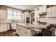 Eat-in kitchen with granite countertops, stainless appliances and tiled backsplash at 12813 Chapel Square St, Carmel, IN 46032