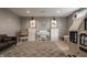 Spacious playroom featuring a white piano, playhouse, and comfortable seating area for relaxation and play at 12813 Chapel Square St, Carmel, IN 46032