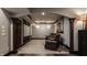 Home theater featuring comfortable reclining seating, a large movie screen, and custom trim work at 12813 Chapel Square St, Carmel, IN 46032