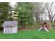 Spacious backyard with a shed, swing set, and ample green space for recreation at 13116 N Departure W Blvd, Camby, IN 46113