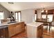 Spacious kitchen features stainless steel appliances, modern cabinets, and an island with a white countertop at 13116 N Departure W Blvd, Camby, IN 46113