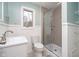 Bathroom showcasing a sink, toilet, window, and shower at 1313 Roseway Dr, Indianapolis, IN 46219