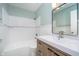 Updated bathroom features white subway tile and modern vanity at 1313 Roseway Dr, Indianapolis, IN 46219