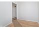 A neutral bedroom offers fresh paint and new carpet at 1313 Roseway Dr, Indianapolis, IN 46219