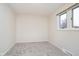 Cozy bedroom featuring updated paint and carpet at 1313 Roseway Dr, Indianapolis, IN 46219
