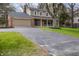 Attractive home featuring brick accents and a spacious driveway at 1320 Bittersweet Dr, Greenfield, IN 46140