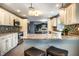 Spacious kitchen with granite countertops, stainless steel appliances, and seating at 1320 Bittersweet Dr, Greenfield, IN 46140