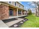 Covered porch with brick columns and tasteful landscaping at 1320 Bittersweet Dr, Greenfield, IN 46140