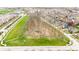 Beautiful aerial view of a community park with walking paths, a central gazebo, and plenty of green space at 13245 E 131St St, Fishers, IN 46037