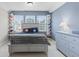 Cozy bedroom with built-in shelves, a comfortable bed, and a dresser, offering ample storage and style at 13245 E 131St St, Fishers, IN 46037