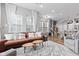 Spacious open-concept living area with a seamless flow to the dining area and kitchen at 13245 E 131St St, Fishers, IN 46037