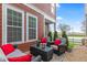 Charming patio with cozy seating and string lights, perfect for outdoor relaxation and entertaining at 13245 E 131St St, Fishers, IN 46037