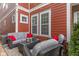 Inviting patio featuring stylish furniture and a decorative glass table, ideal for relaxing outdoors at 13245 E 131St St, Fishers, IN 46037