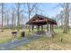 Charming picnic shelter in the park, equipped with picnic tables and a grill for outdoor enjoyment at 13245 E 131St St, Fishers, IN 46037