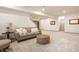 Finished basement space with neutral carpet, contemporary furnishings and recessed lighting at 1395 Chatham Hills Blvd, Westfield, IN 46074