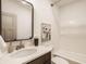 Bright bathroom featuring a shower over tub with a large modern mirror at 1395 Chatham Hills Blvd, Westfield, IN 46074
