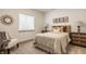 Comfortable bedroom featuring neutral tones, a cozy bed, and stylish décor at 1395 Chatham Hills Blvd, Westfield, IN 46074