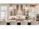 Bright kitchen with white cabinets, stainless steel appliances, granite counters, and pendant lighting at 1395 Chatham Hills Blvd, Westfield, IN 46074