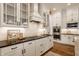 Well-equipped kitchen with white cabinetry, ample storage, modern appliances, and stylish countertops at 1395 Chatham Hills Blvd, Westfield, IN 46074