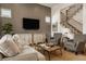 Comfortable living room with a TV, fireplace, and cozy seating at 1395 Chatham Hills Blvd, Westfield, IN 46074