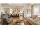 Inviting living space with an open layout flowing into the kitchen and dining areas at 1395 Chatham Hills Blvd, Westfield, IN 46074