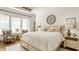 Serene main bedroom featuring a plush bed, tray ceiling, and stylish decor with lots of natural light at 1395 Chatham Hills Blvd, Westfield, IN 46074