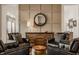 Comfortable sitting room with leather armchairs, stylish decor, and a cozy ambiance at 1395 Chatham Hills Blvd, Westfield, IN 46074