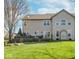 A spacious backyard with a deck and lush lawn at 14720 Warner Trl, Westfield, IN 46074