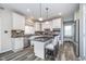 Well-appointed kitchen boasts granite countertops, stainless steel appliances, and a functional island at 14720 Warner Trl, Westfield, IN 46074