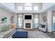 Bright and airy living room with high ceilings, a fireplace, a large rug, and modern decor at 14720 Warner Trl, Westfield, IN 46074