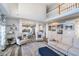 Open-concept living room with high ceilings, lots of natural light, and views of the kitchen and upper level at 14720 Warner Trl, Westfield, IN 46074