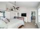 Beautiful main bedroom features a walk-in closet, vaulted ceiling, a ceiling fan, and carpet floors at 14720 Warner Trl, Westfield, IN 46074