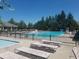 Relaxing pool area with lounge chairs, perfect for enjoying sunny days at 14720 Warner Trl, Westfield, IN 46074