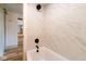 A well-lit bathroom with white marble tile and modern fixtures in a bright interior at 1515 Dawson St, Indianapolis, IN 46203
